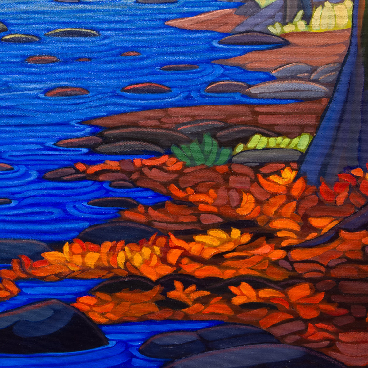 Detail of Resilience showing cobalt-blue water, rounded dark rocks and orange-red fallen leaves around the base of a blue-violet tree trunk.