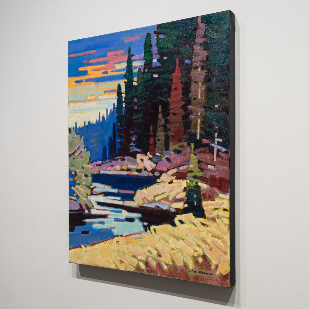 Angled view of Cameron Bird's Klinaklini River Morning showing the 1.5 inch canvas depth and finished black edge.