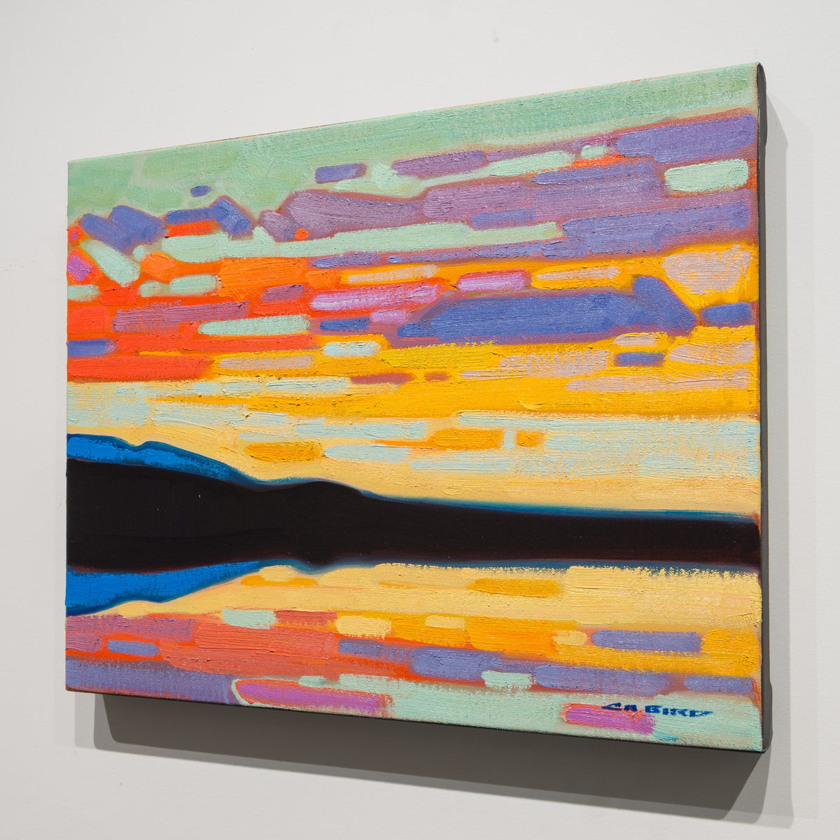 Angled view of Cameron Bird's Chilcotin Summer showing the 1.5 inch canvas depth and finished black edge.
