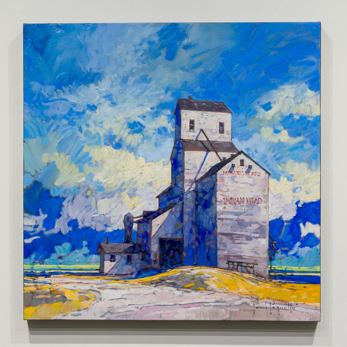 Prairie Giant by Paul Paquette, 30 × 30 inch oil on canvas depicting a pale grain elevator beneath a blue, cloud-filled sky.