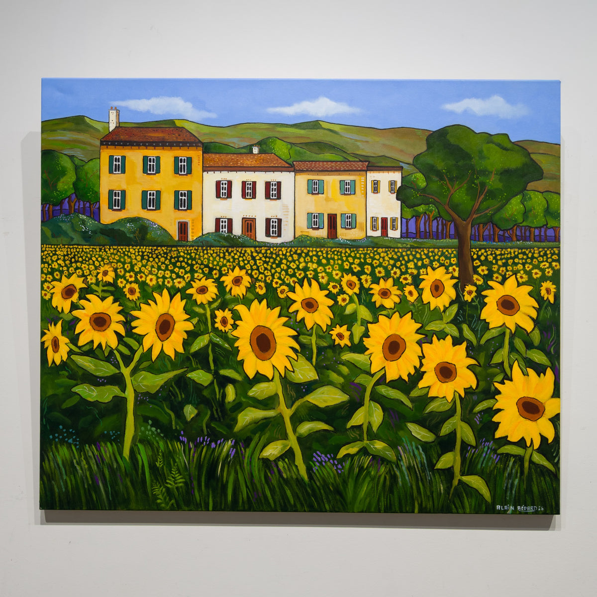 Retour en Provence by Alain Bédard, acrylic on canvas showing a broad sunflower field before pale ochre farmhouses, a large green tree and rolling hills.