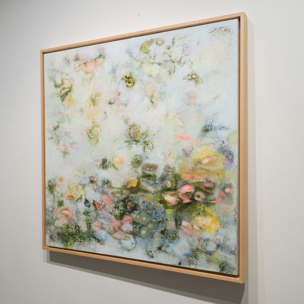 Angled view of Ilinca Ghibu's Le Chant de l etang showing the artist frame and 1.5 inch gallery-stretched canvas.