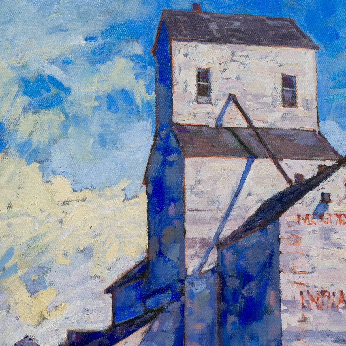 Detail of Paul Paquette’s Prairie Giant showing the grain elevator’s upper storey, sloping roofs and blue shadows.